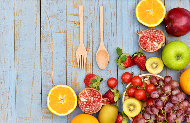 水果几种水果和蔬菜的顶视图美味梨木材