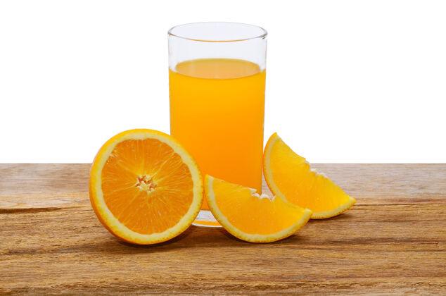桌子橙汁和橙子片放在木桌上吃叶子活力