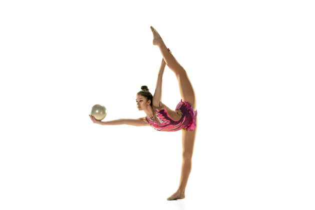 休闲年轻柔韧的女孩孤立在白色的背景下十几岁的女模特作为一个艺术体操艺术家练习设备紧身衣杂技演员运动员