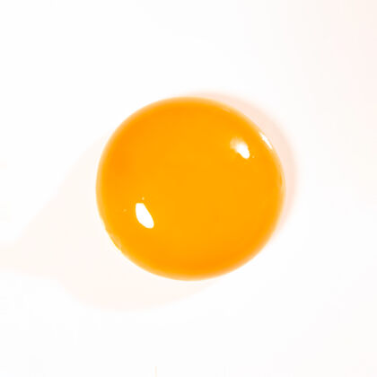 空中蛋黄在明亮的表面快乐时尚鸡蛋
