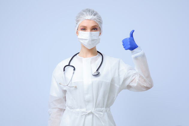 感染戴着医疗帽和面罩的女医生或护士的肖像保健治疗女性
