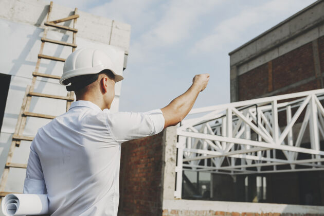 衬衫男性成人阿希特显示在哪里开始工作 上午对建设中的建筑物工人劳工手