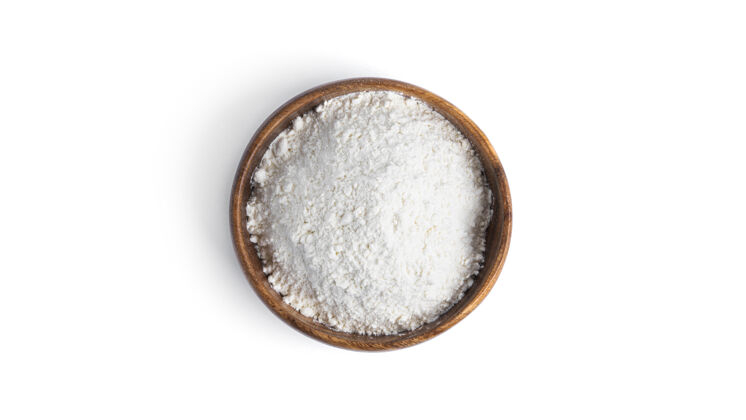 燕麦把面粉放在一个木碗里 放在一个白色的盘子里背景高高质量的照片谷物谷类生的