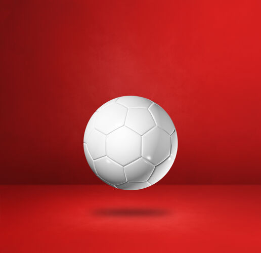 背景白色足球隔离在一个红色的工作室背景游戏单人游戏