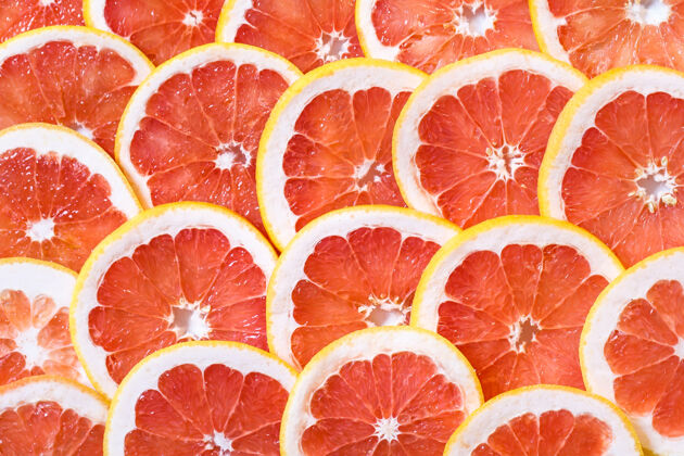 切片特写镜头的柚子片作为背景圆形部分健康