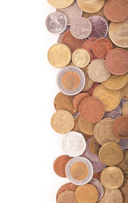 硬币白色背景上不同国家的硬币金融交换欧元