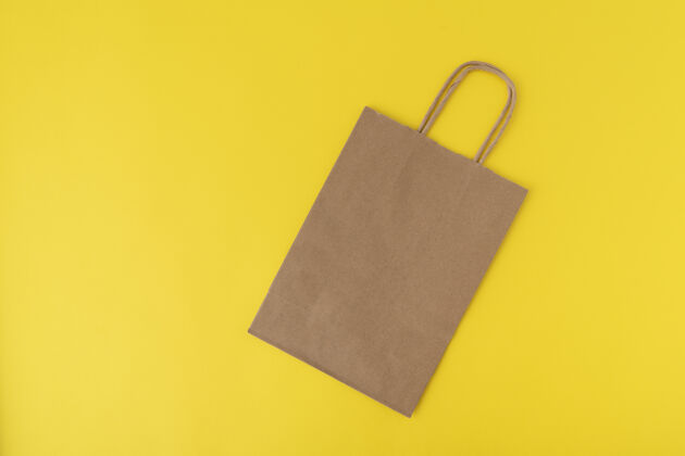 升华黄色纸袋背景.copy空格.mock向上0.0浪费销售袋环保