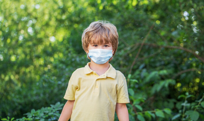 人儿童戴口罩在电晕病毒和流感爆发疾病口罩呼吸系统