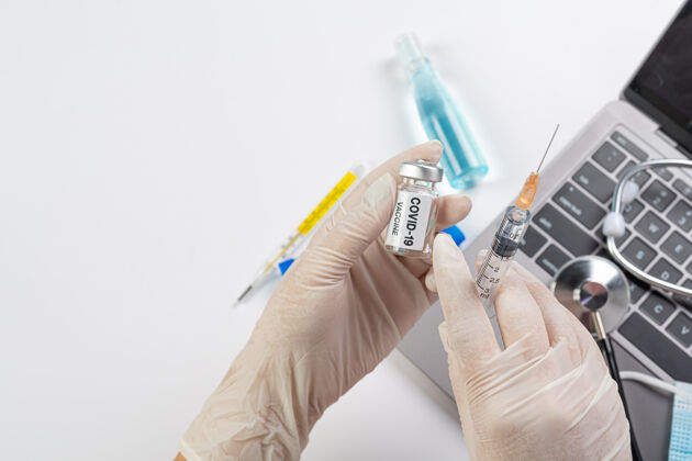 流感把科学家或医生手里的一小瓶疫苗合上实验分析流行病