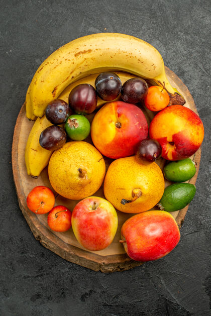 芒果顶视图水果组成深灰色背景上的新鲜水果水果组成饮食多汁