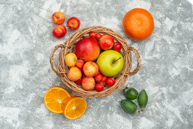 可食用水果顶视图水果组成李子和苹果上的光白色空间生新鲜健康
