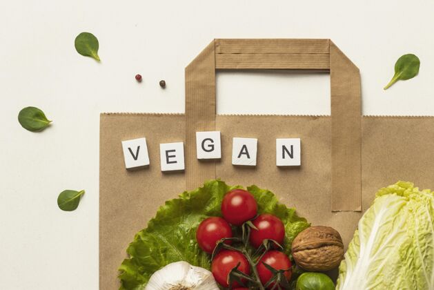 食品平铺的什锦蔬菜纸袋和字素食纸袋商品蔬菜