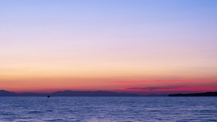 光爱琴海上的夕阳 远处的船和陆地 水 希腊日落海景Hdr