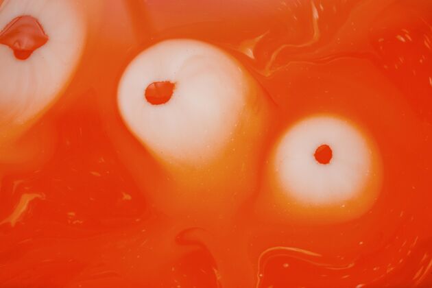 背景平坦的橙色液体背景宏特写抽象