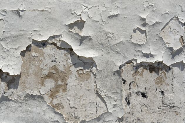 墙油漆掉下来的旧墙材料室内城市